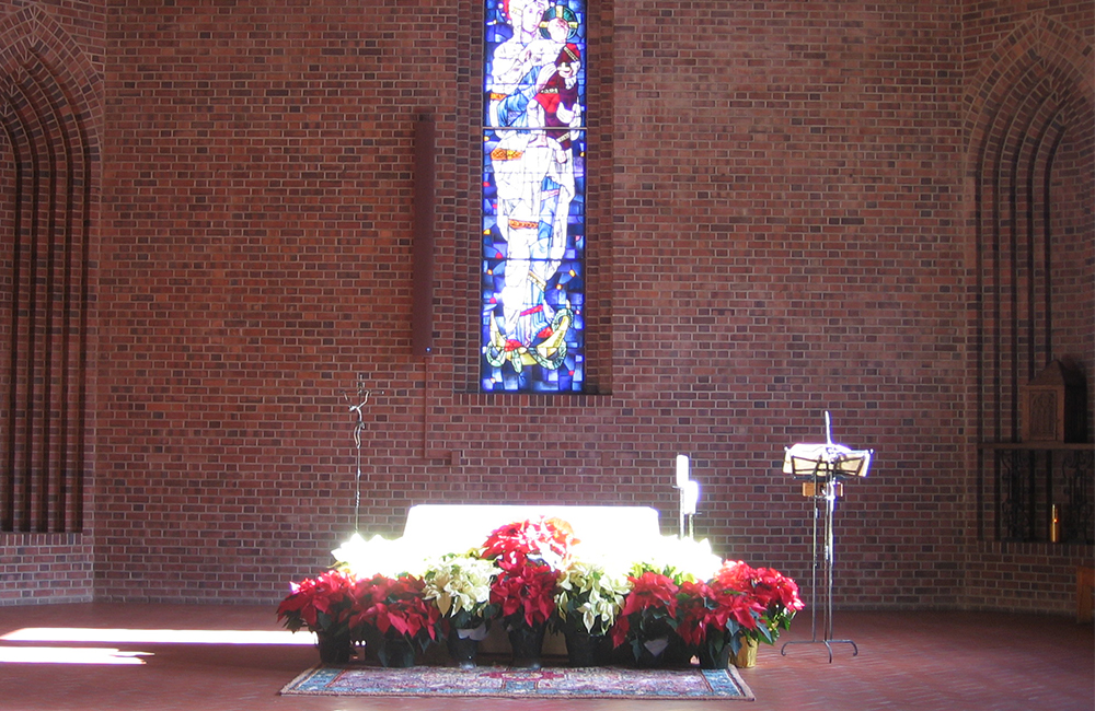 Snowmass Church interior, altar with flowers