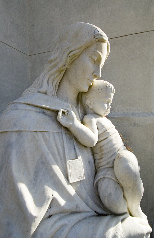 Blessed Brithday; a statue of the Virgin Mary holding the infant Jesus