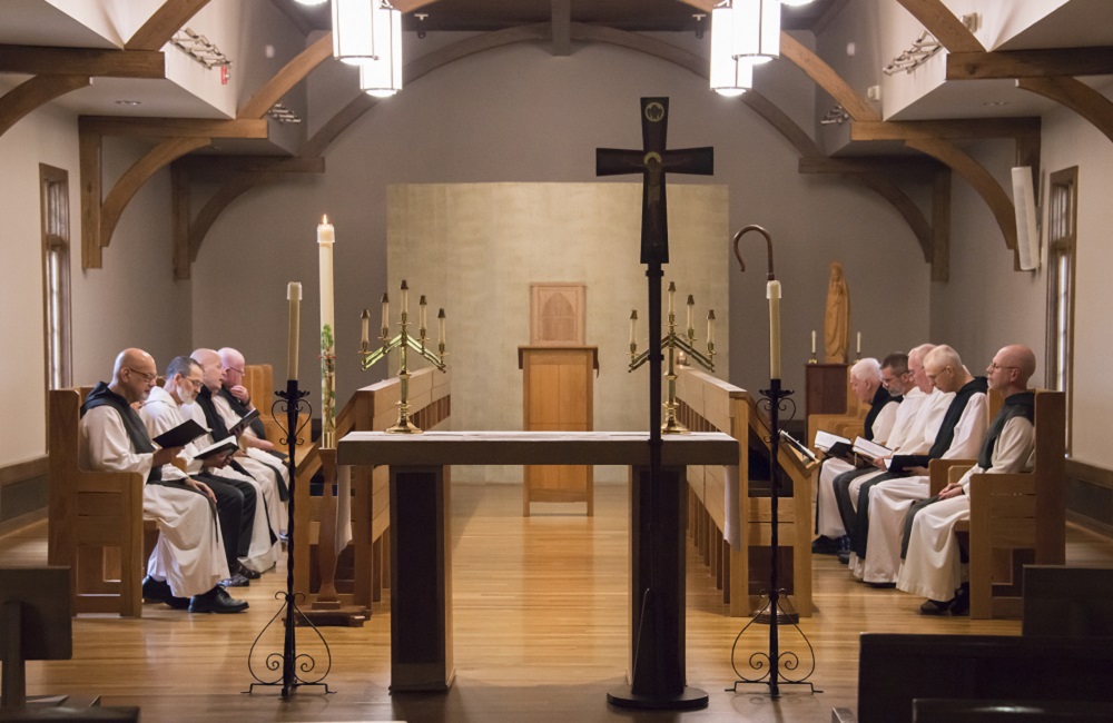 Monks seated in choir in Abbey Church