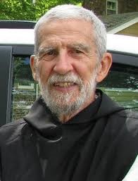 headshot of bearded monk Dom John Eudes smiling