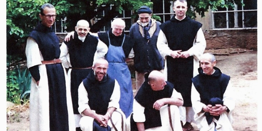 Trappist Monks smiling for group photo