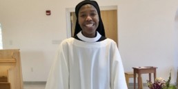 Sr. Myriam professes solemn vows, smiling in new cowl