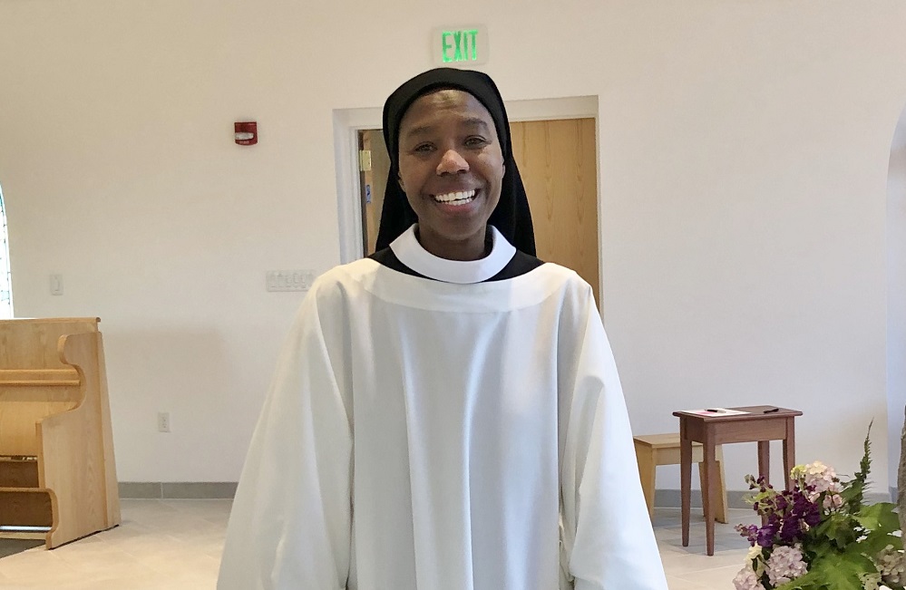 Sr. Myriam professes solemn vows, smiling in new cowl