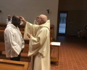 Fr. Joe anoints Jophan in choir