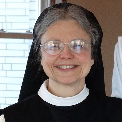 Sister Kathleen smiling in habit