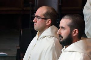 two monks look forward