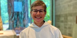 Sister Gertrude's Solemn Profession, smiling in new white cowl
