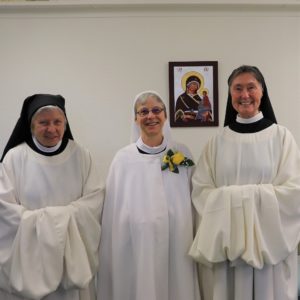 Sister Sharon first profession with Mother Abbess and another nun 