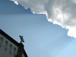 clouds over church and cross