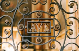 Hail Mary- Ave on ornamental wrought iron gate, form a photo by Gabriella Clare Marino