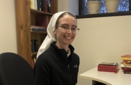Sr. Harriet working in office