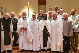 Monastic Community of Mepkin Abbey gathered around new simple professed Br. Ambrose
