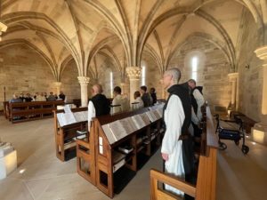 monastic experience of monks in choir in gothic stone church