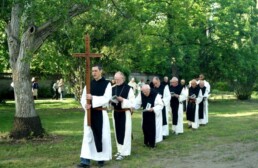 Line of monks in procession following the Holy Cross