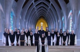 Trappist Monks and Nun pose for photo in large church